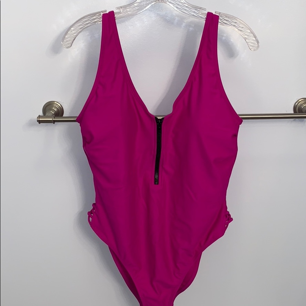 Never worn!  Xhilaration swimsuit